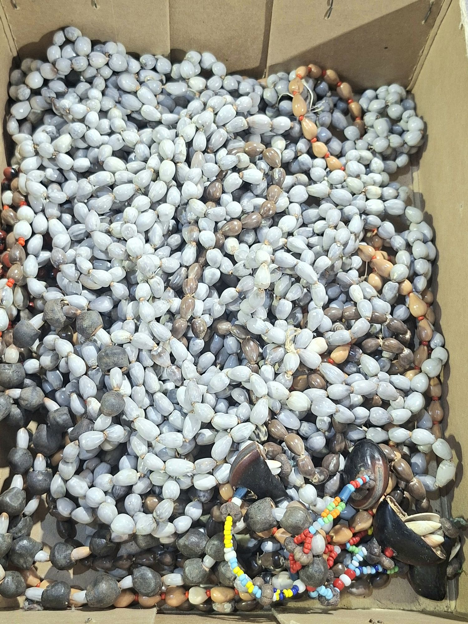 545 · P.N.G. SEED NECKLACES