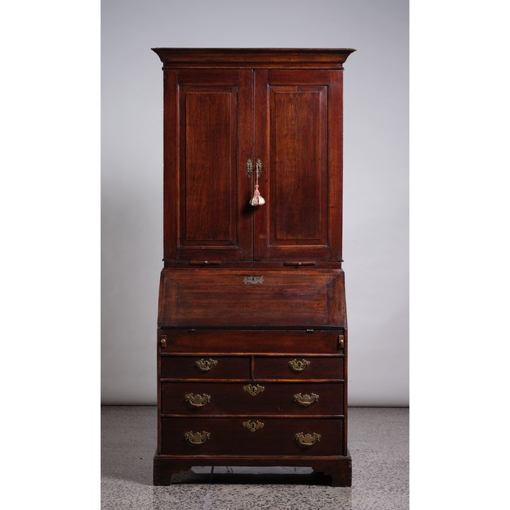 A small 18th Century English oak bureau bookcase