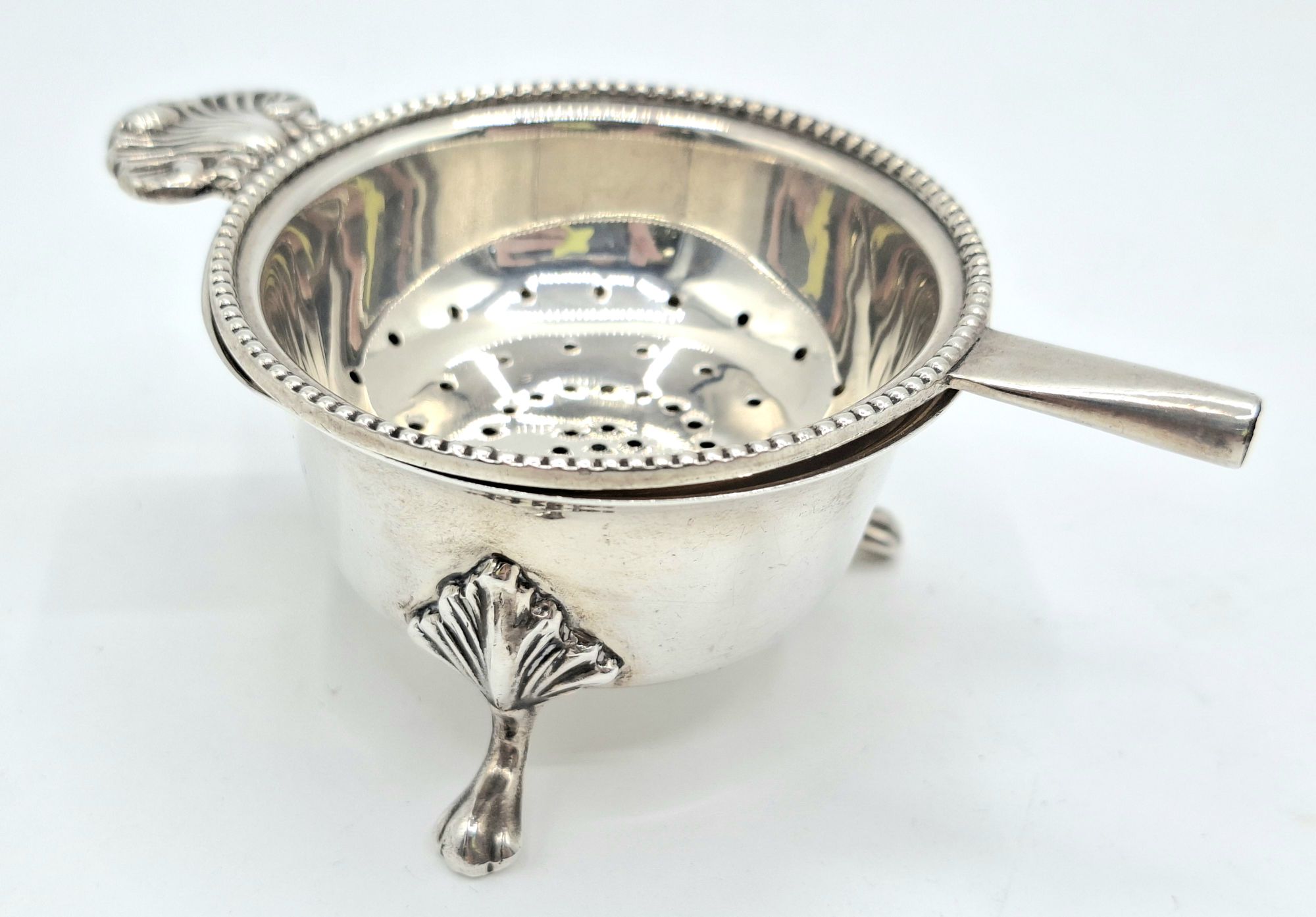 167 · STERLING SILVER STRAINER AND UNDER TRAY