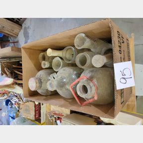 Assortment of glass containers, canning jars and vases