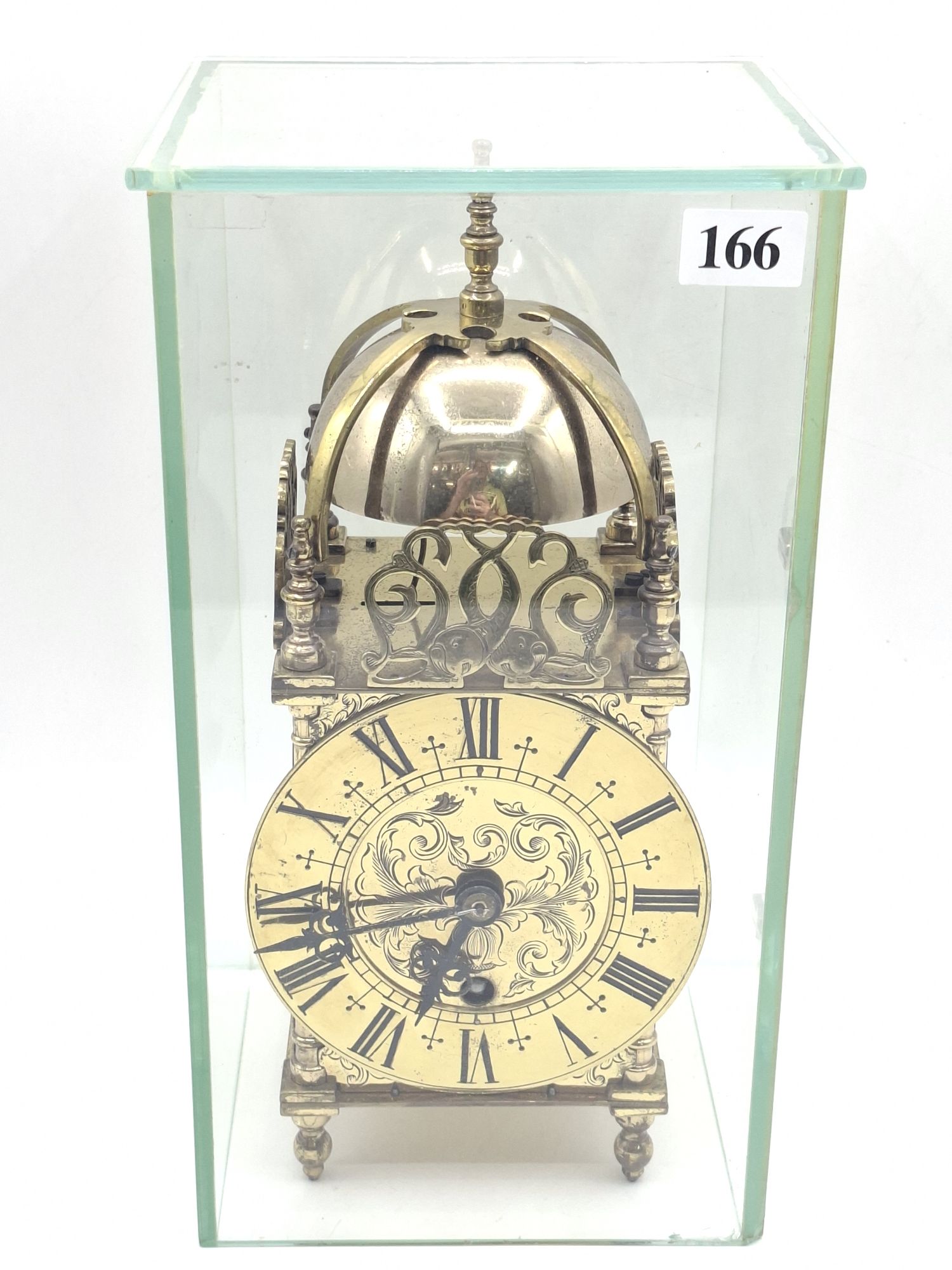 166 · A BRASS LANTERN CLOCK