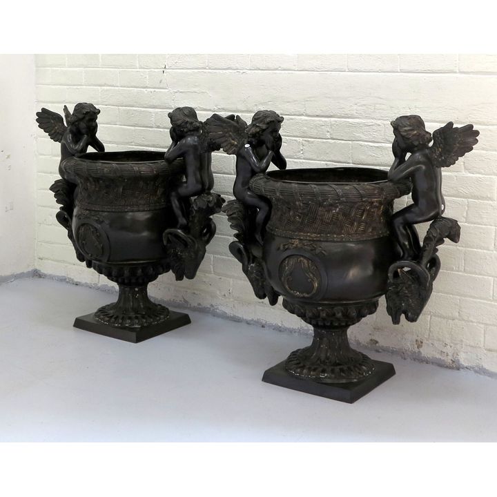 PAIR OF LARGE AND HEAVY BRONZED CAST METAL TWO-HANDLED URNS