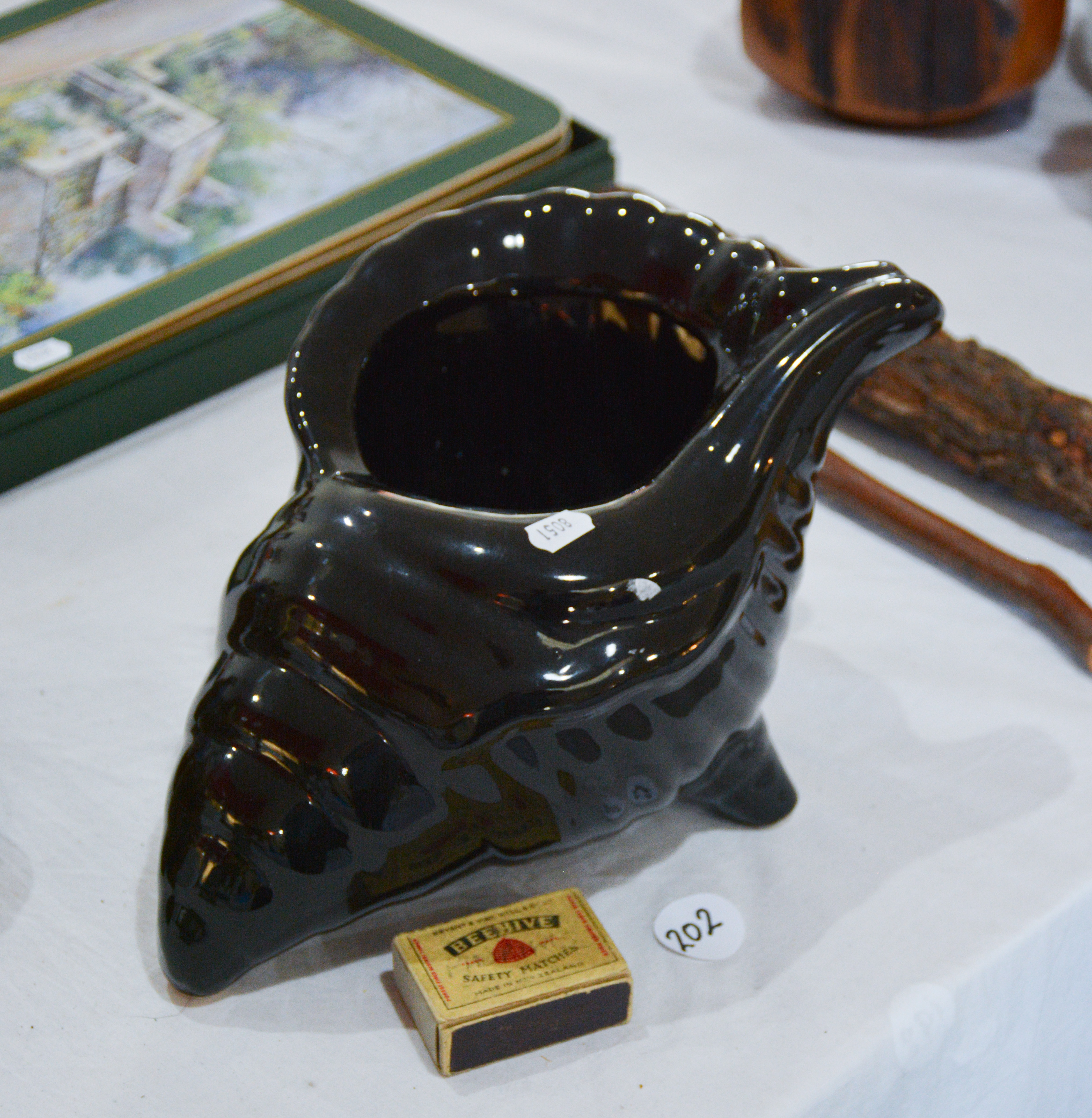 Black Ceramic Shell Ornament — NZ auction result