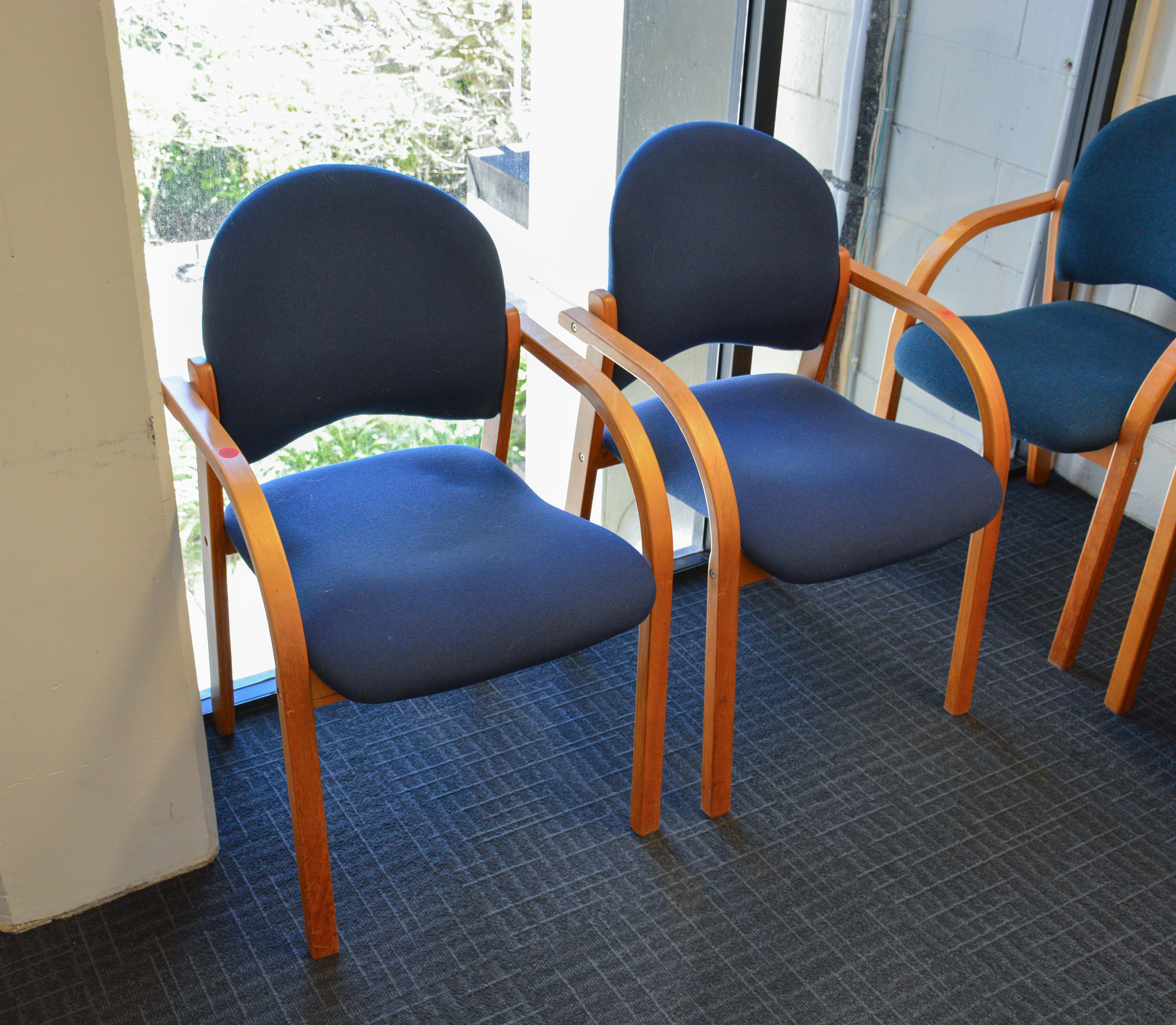 Wood and Blue Textile Chairs x 2 — sold at auction in New Zealand for $10