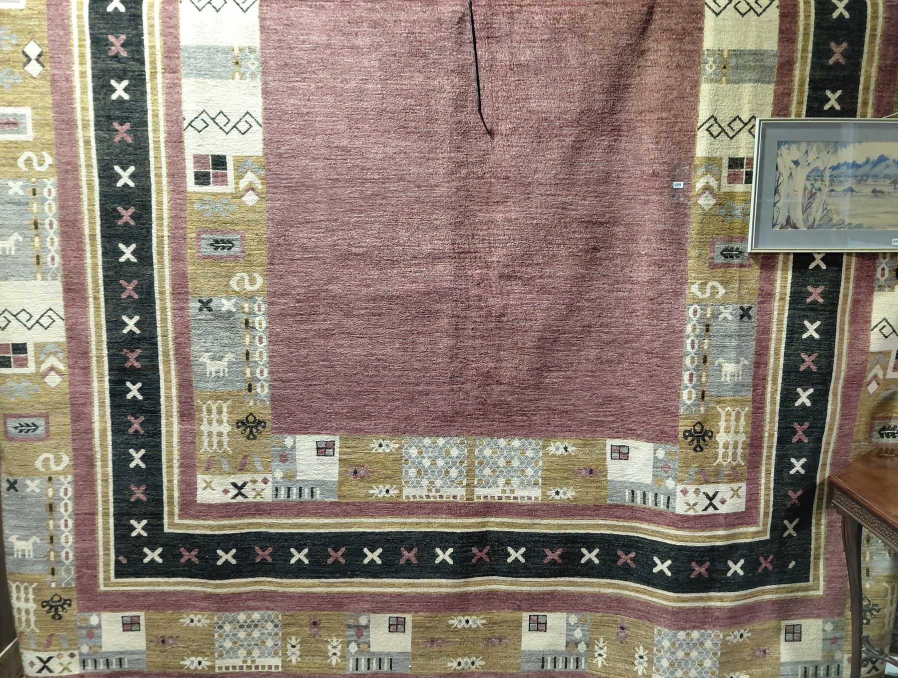699 · LARGE TRIBAL RUG