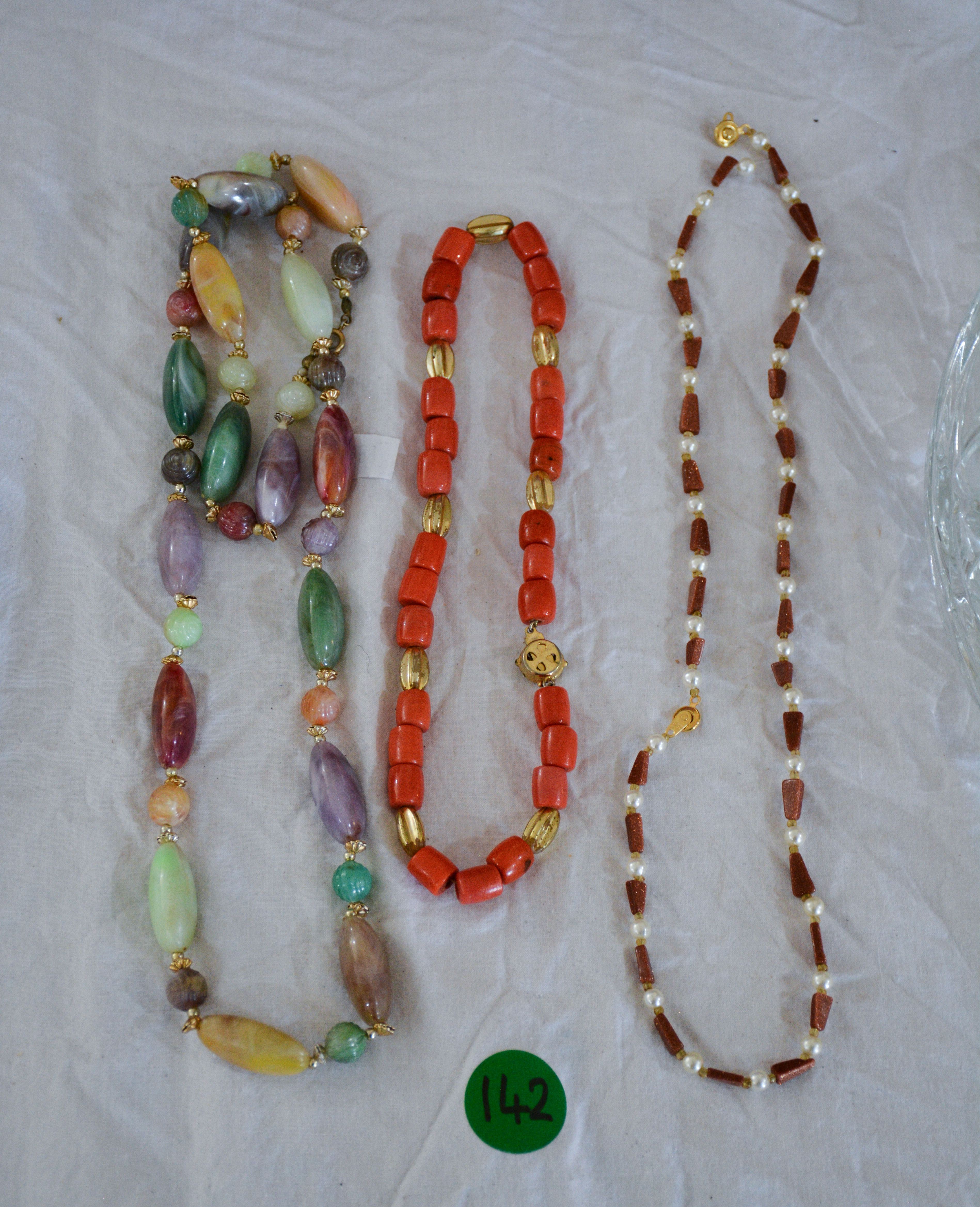 Necklaces x 3 — sold at auction in New Zealand for $20