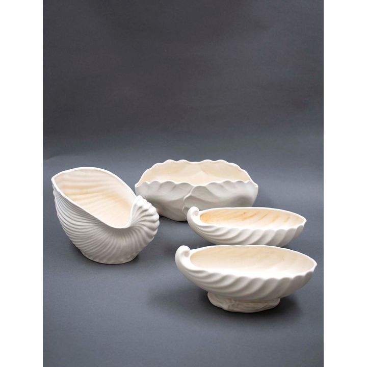 Crown Lynn Potteries - A collection of four shell trough vases