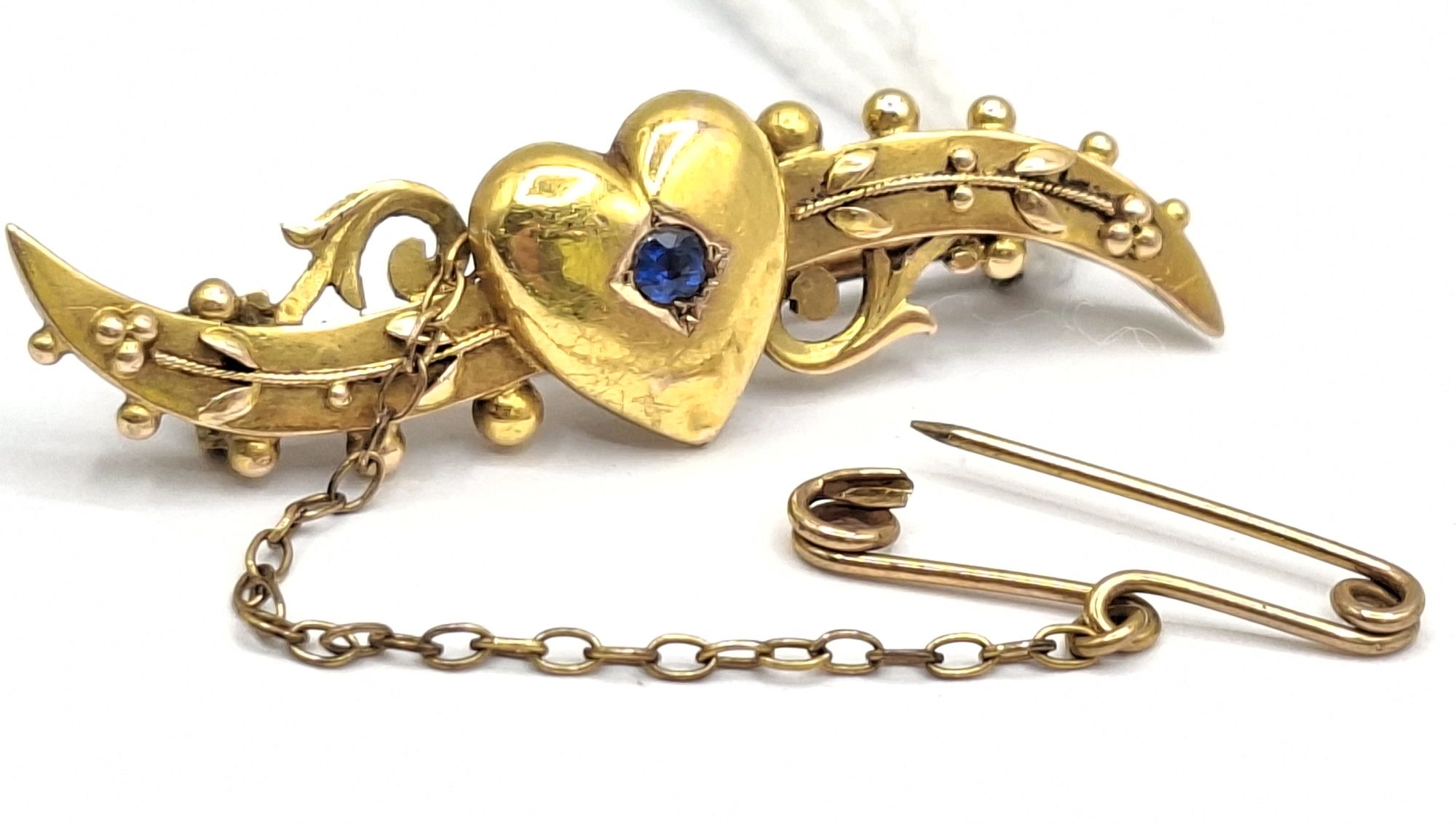 1122 · 15CT GOLD BROOCH