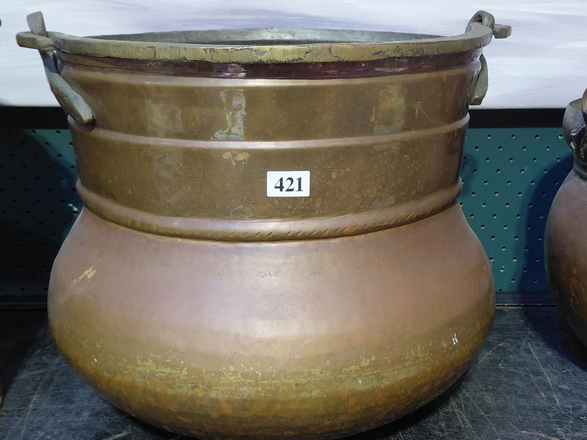 421 · AN ANTIQUE COPPER POT