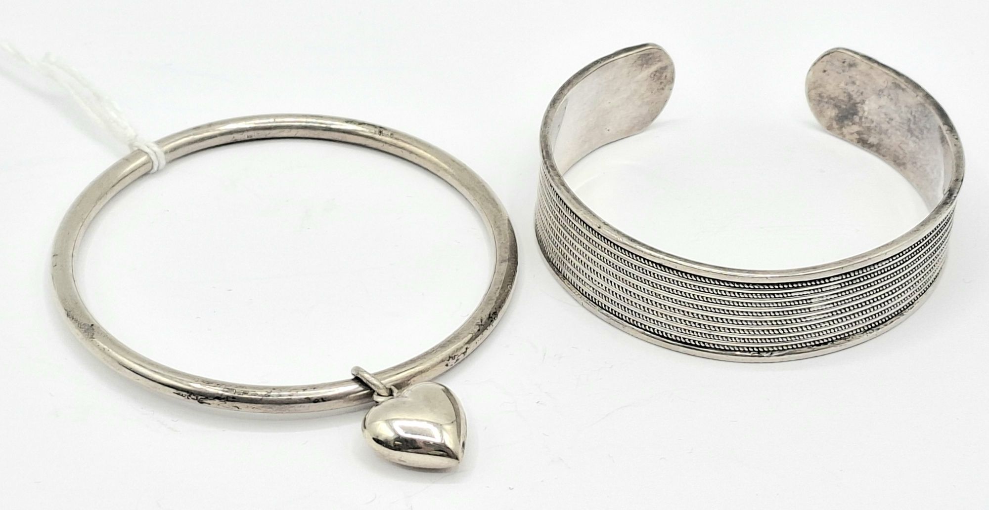 1039 · STERLING SILVER BRACELETS
