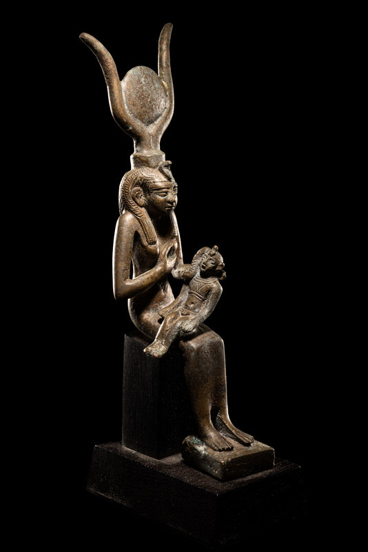An Egyptian Bronze Isis and Horus 
Height 6 1/4 inches (16 cm).