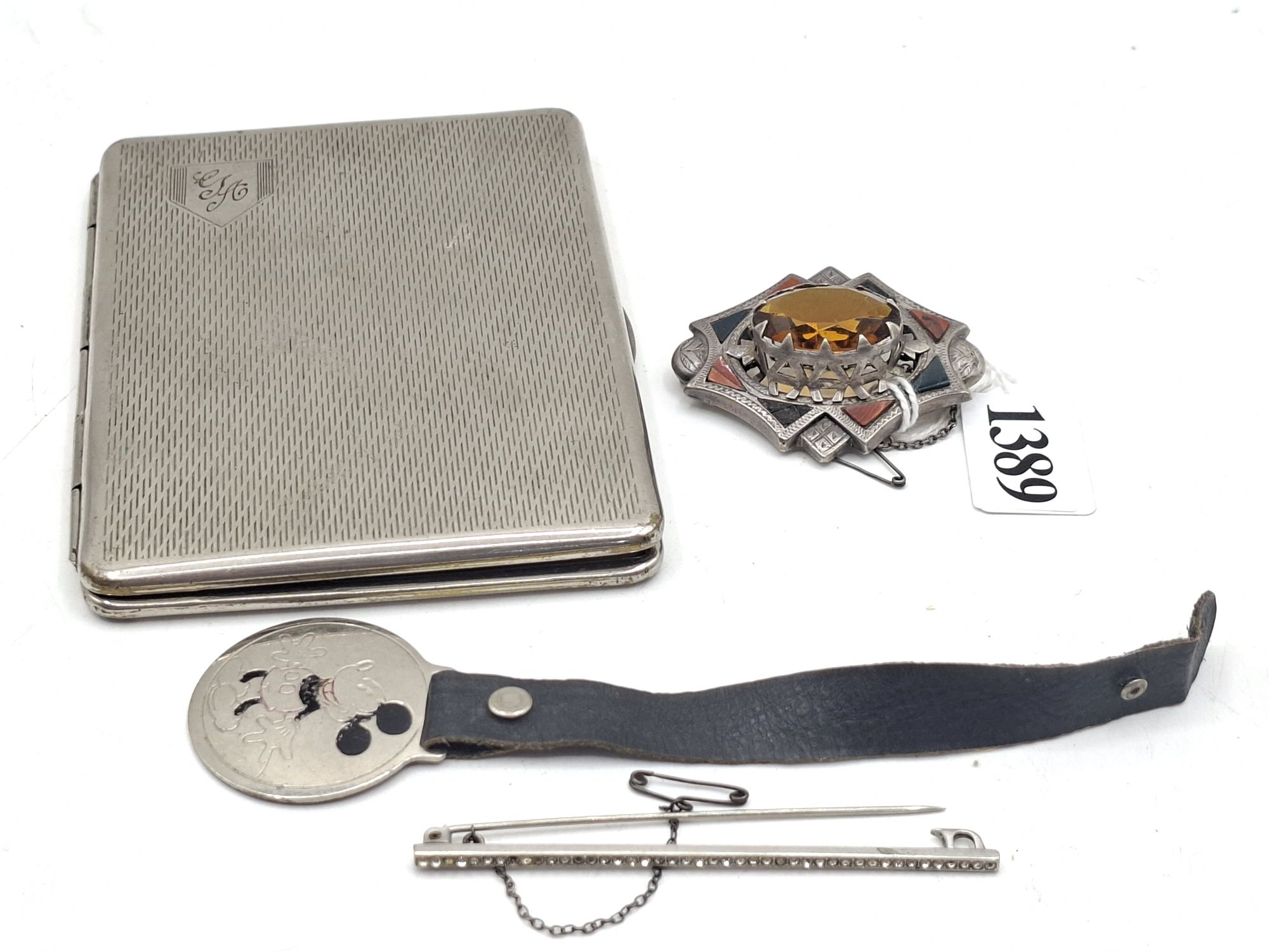 Cigarette Case, Brooches And Mickey Mouse Disk