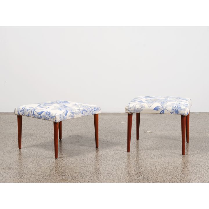 A pair of 1950s teak stools