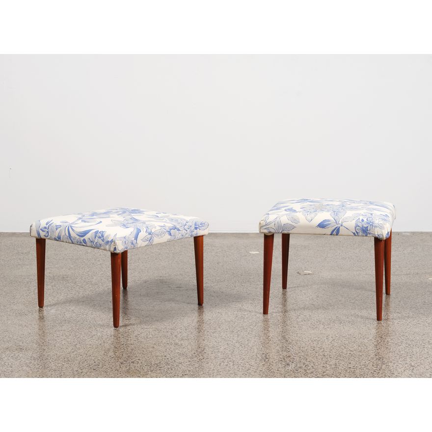 A pair of 1950s teak stools