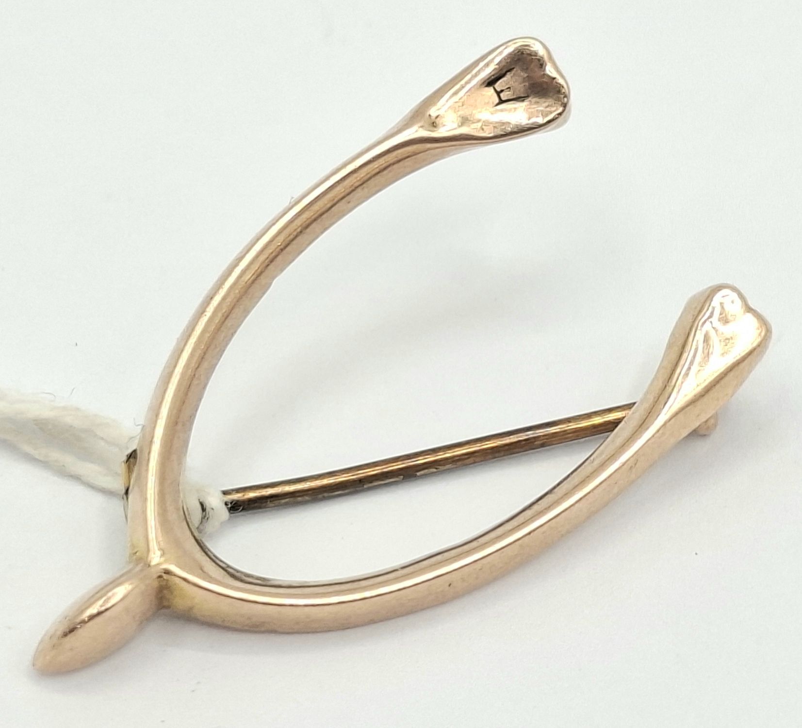 258 · 9CT LUCKY WISHBONE BROOCH
