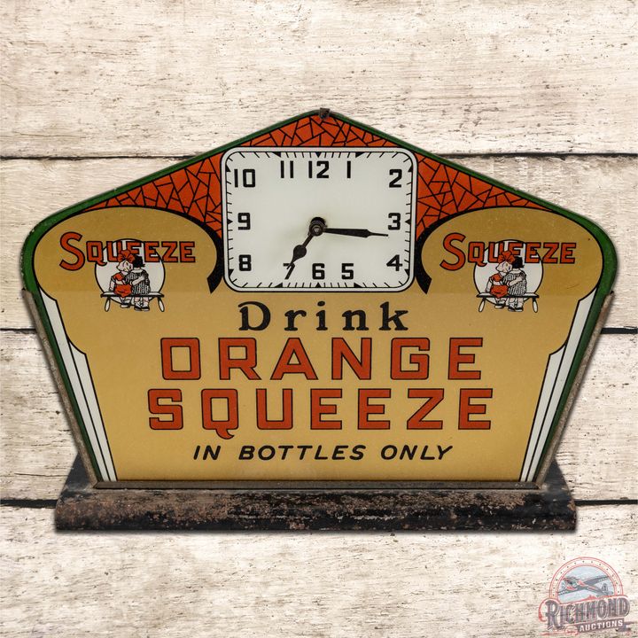Rare Drink Orange Squeeze in Bottle Reverse Painted Glass Advertising Clock w/ Logo
