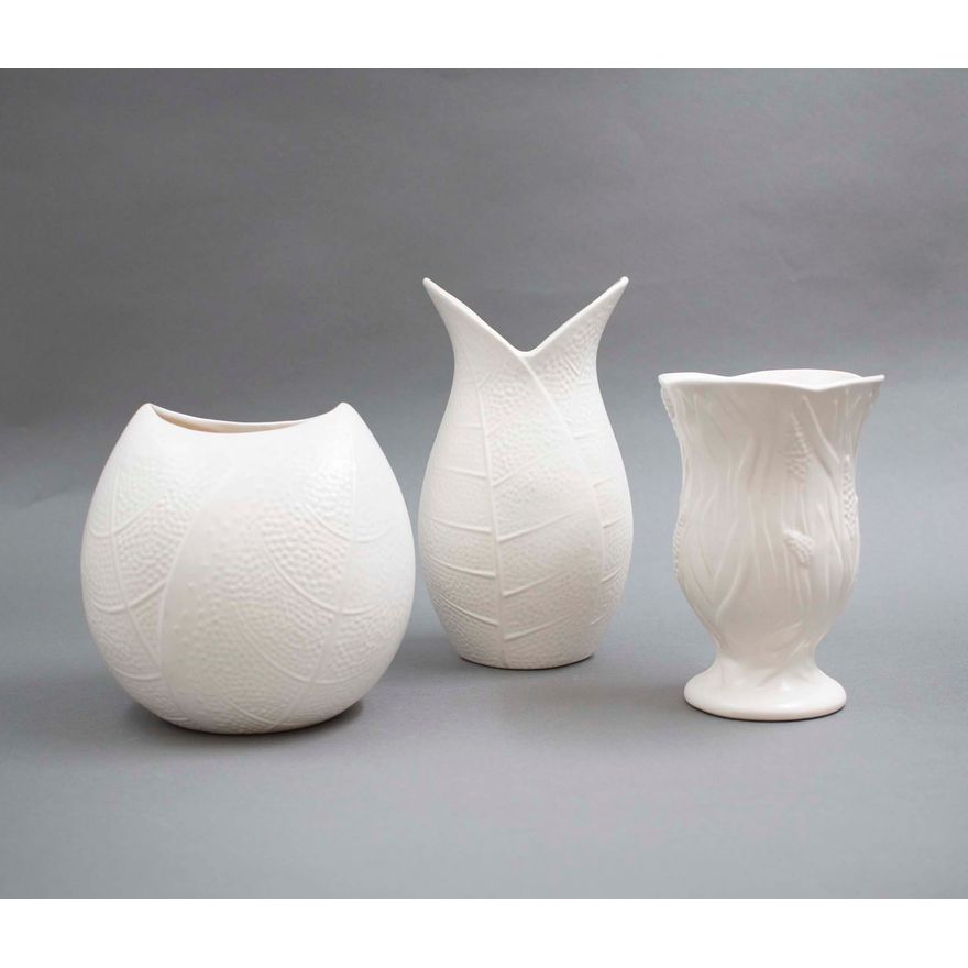 Crown Lynn Potteries - A collection of three bright white vases