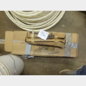 Box of new garage door hardware and other parts