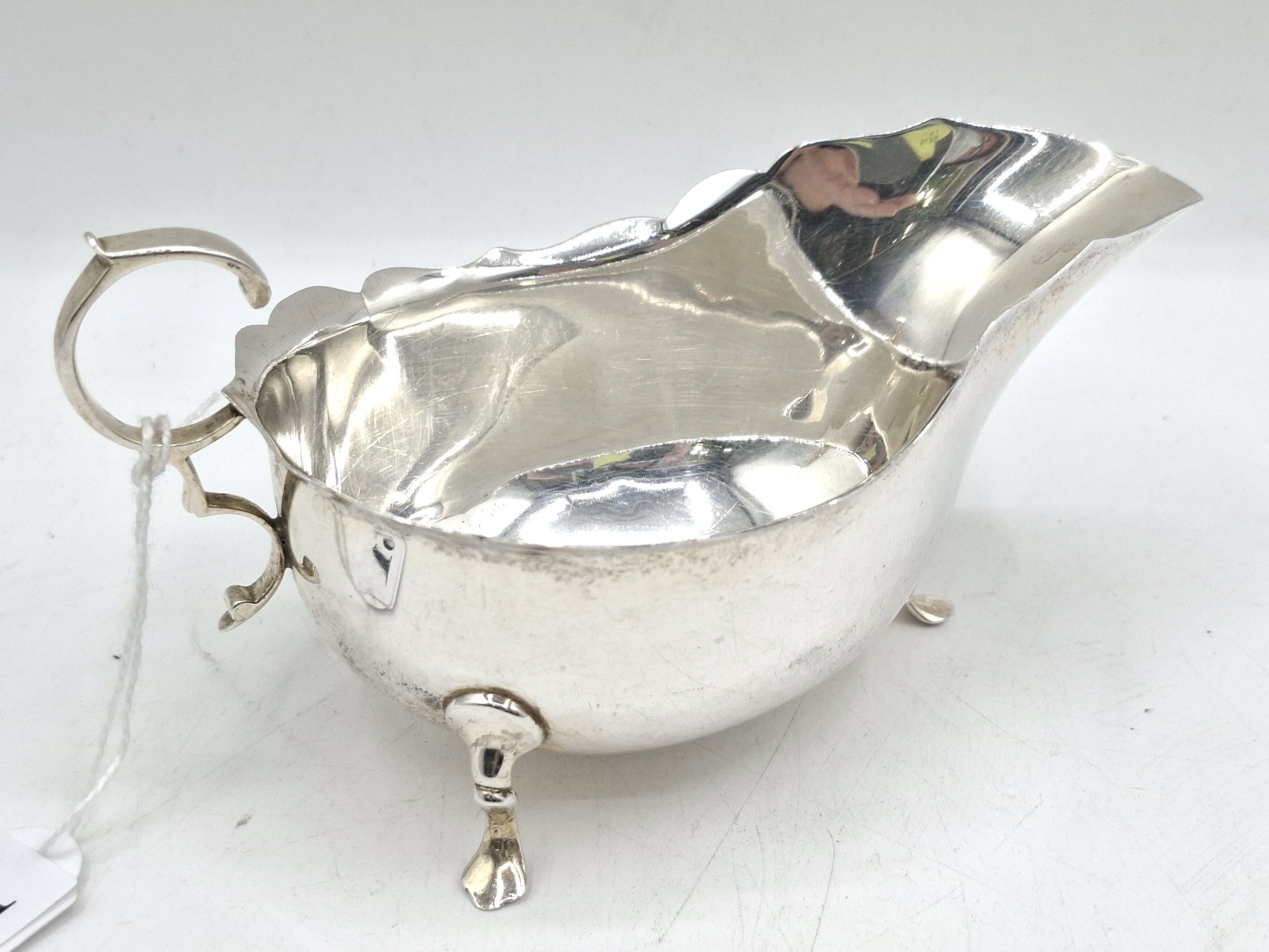 A Sterling Silver Gravy Jug