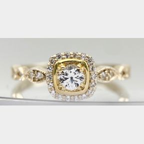 BEAUTIFUL 0.25CT DIAMOND HALO RING SET IN SILVER AND 18CT YELLOW GOLD.2G