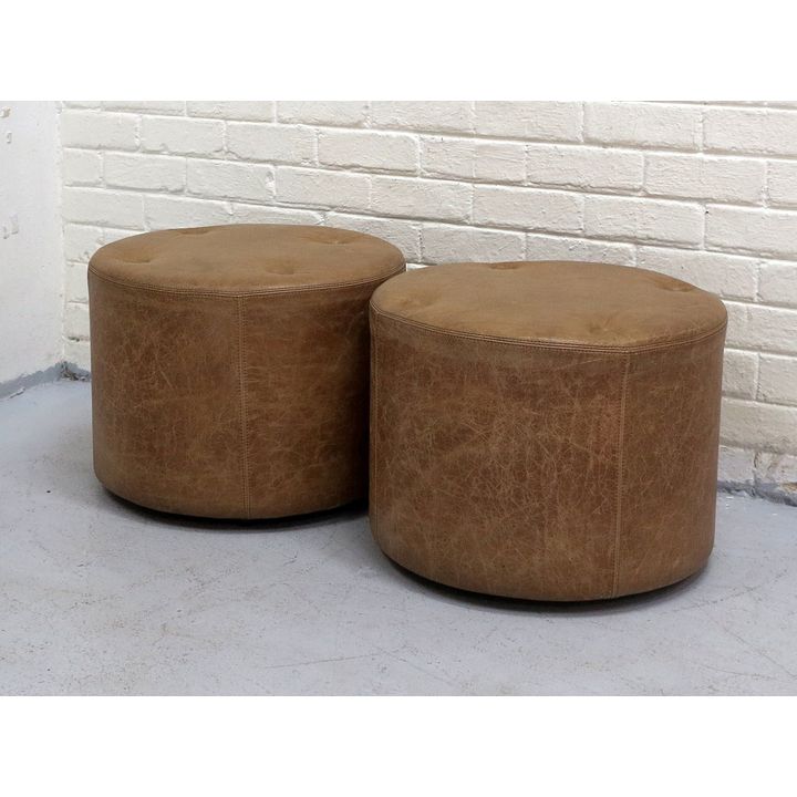 PAIR OF LEATHER UPHOLSTERED OTTOMANS