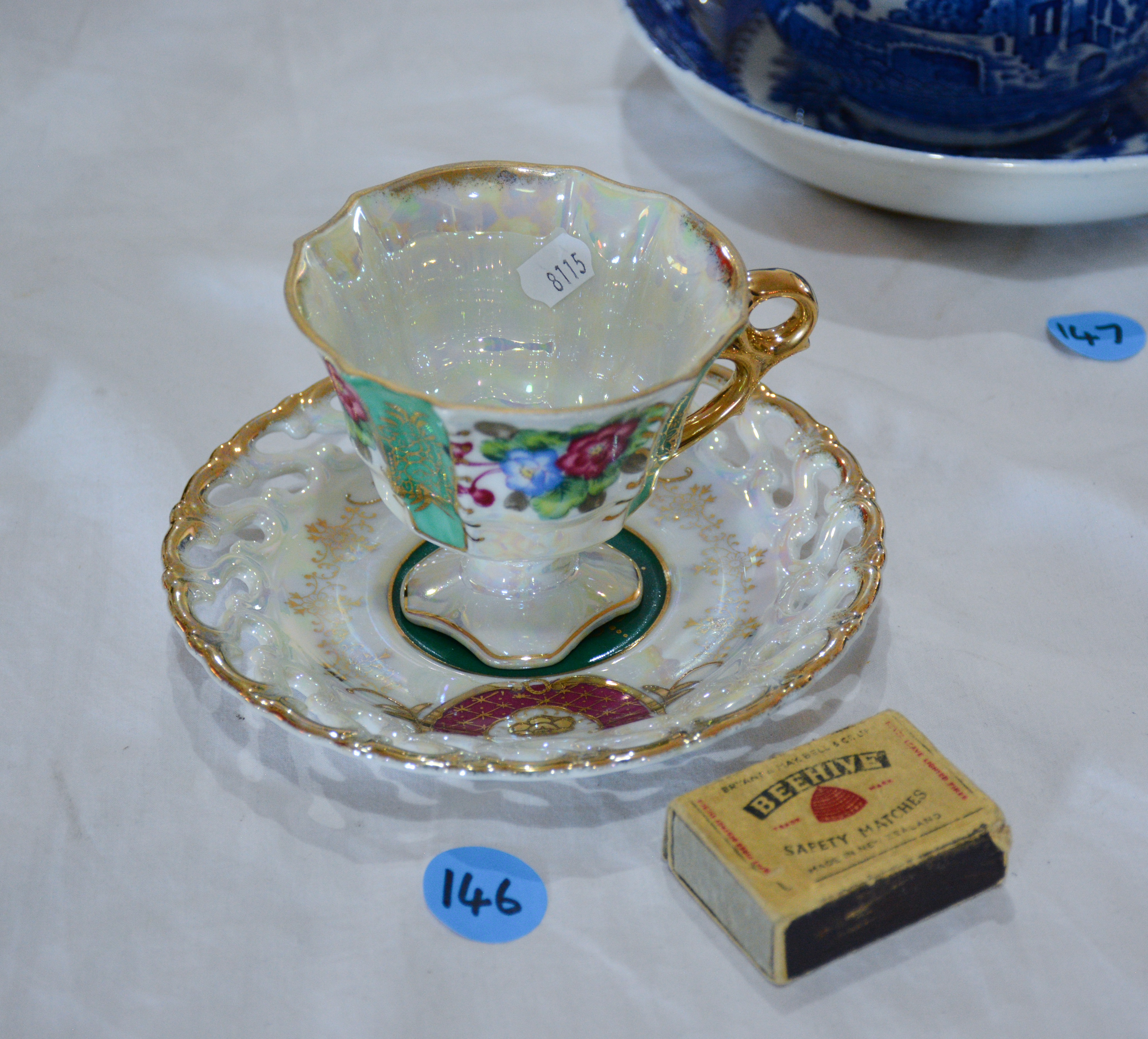 Vintage Pearlescent Teacup and Saucer — sold at auction in New Zealand for $10