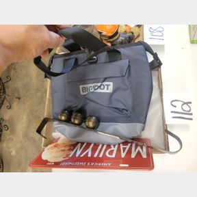 Bigfoot lunch cooler and Marilyn Monroe license plate