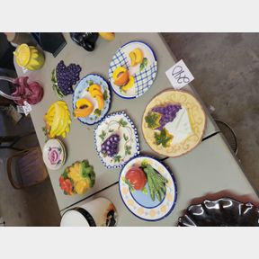 Large assortment of fruit plates and wall d�cor