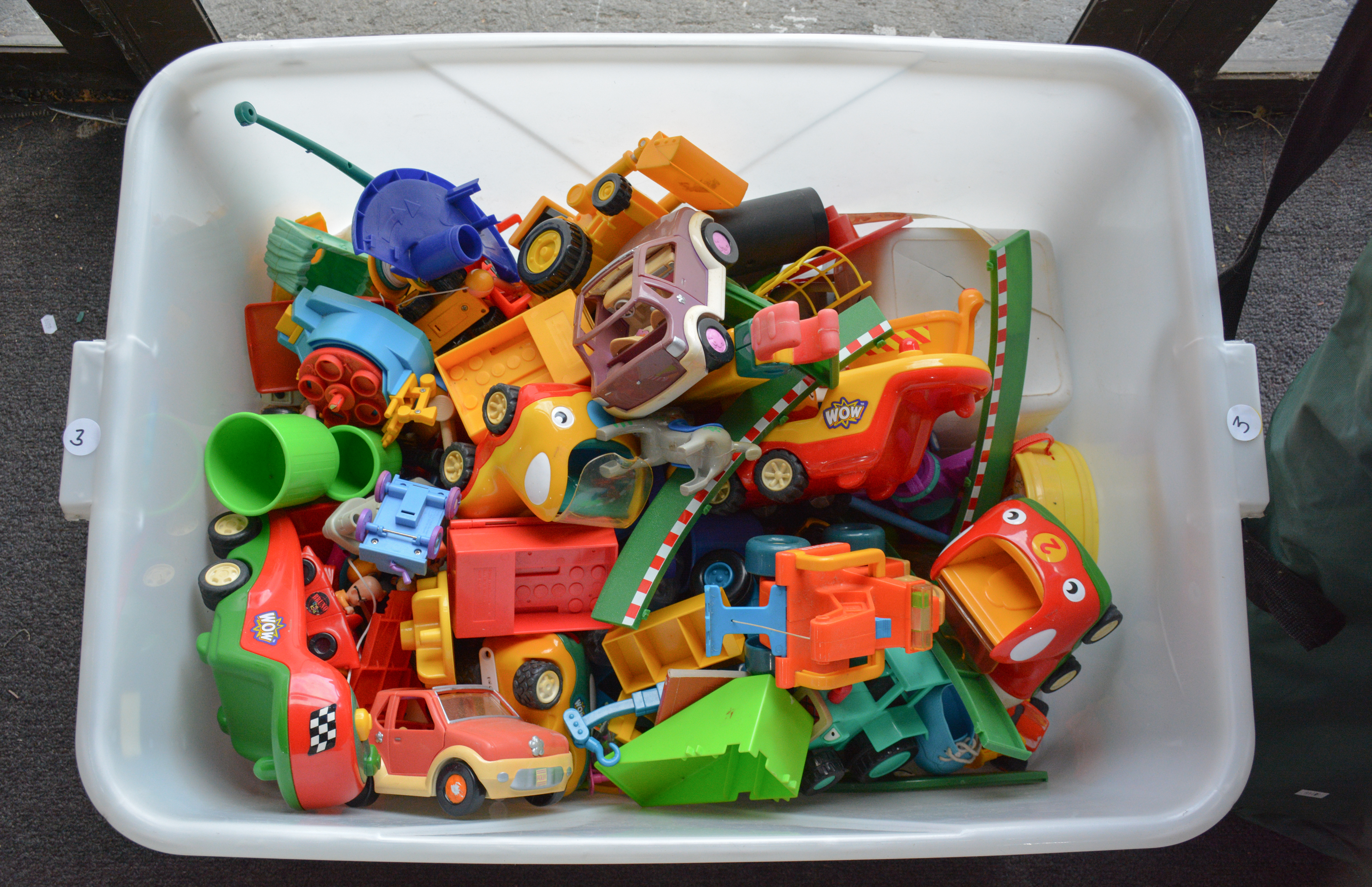 Large Container of Toys — sold at auction in New Zealand for $15