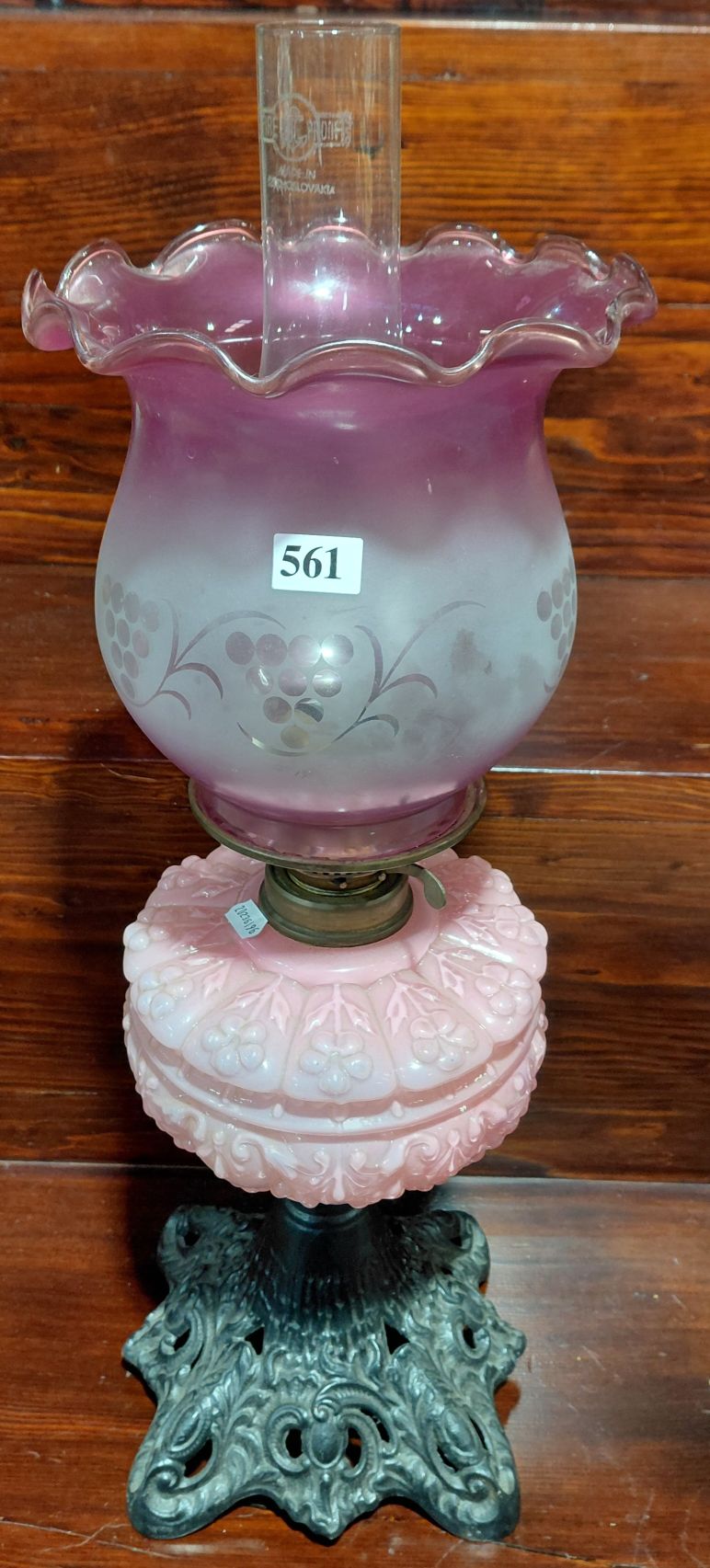 561 · ANTIQUE PINK AND WHITE GLASS OIL LAMP