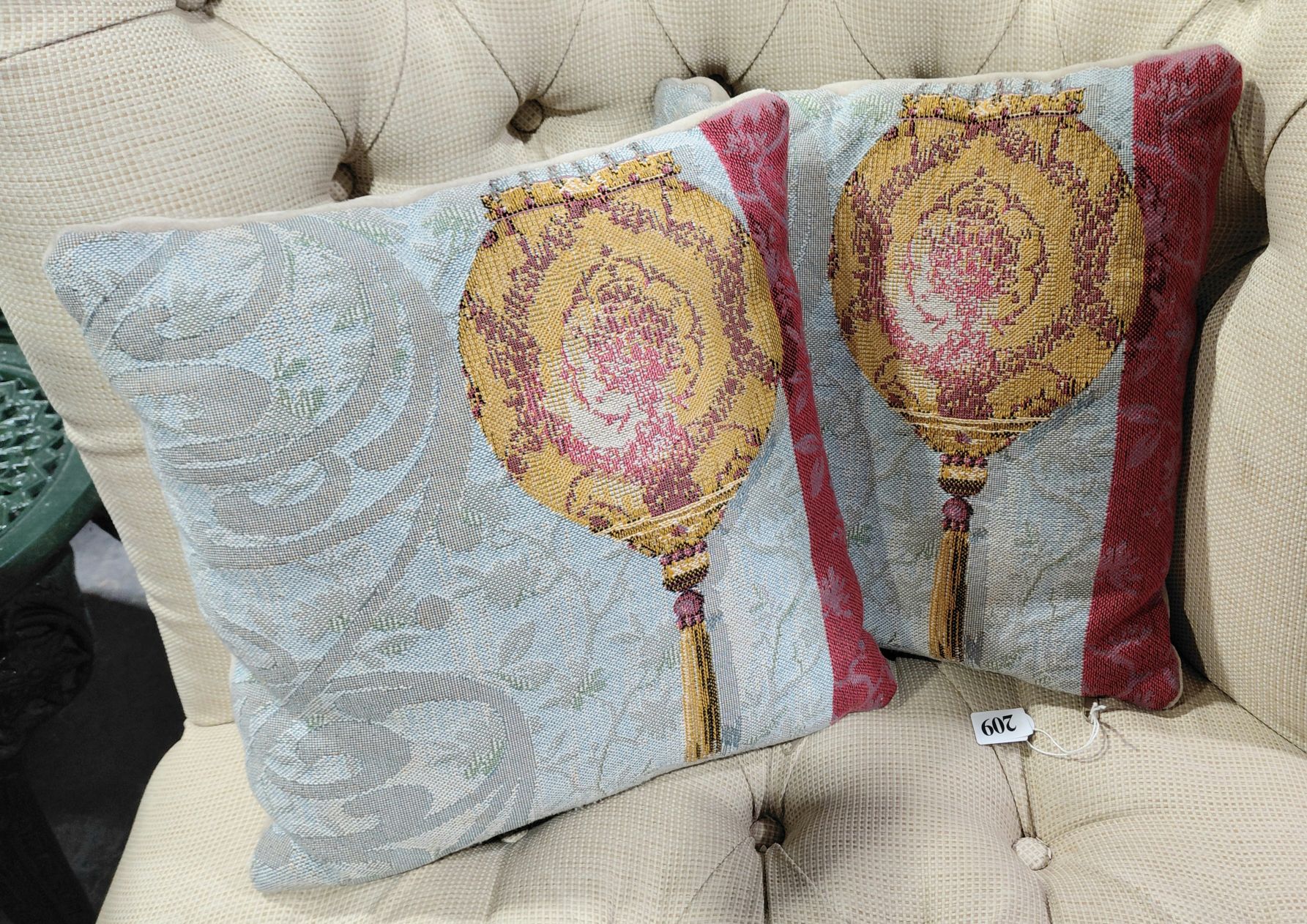 209 · A PAIR OF TAPESTRY CUSHIONS
