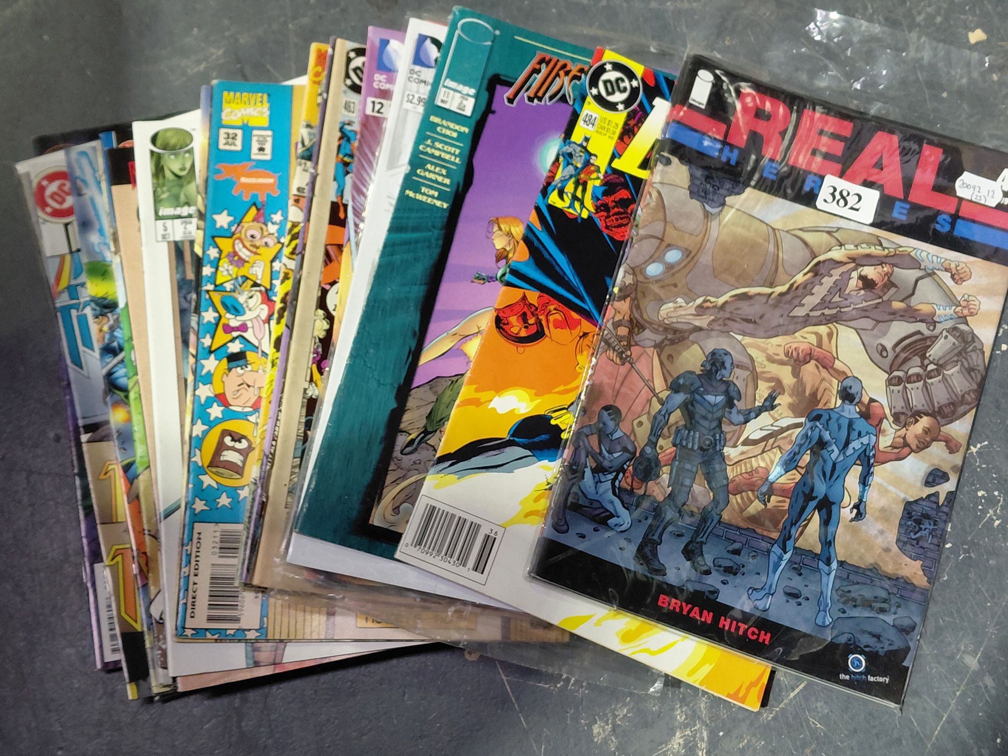 382 · 23 ASSORTED COMICS
