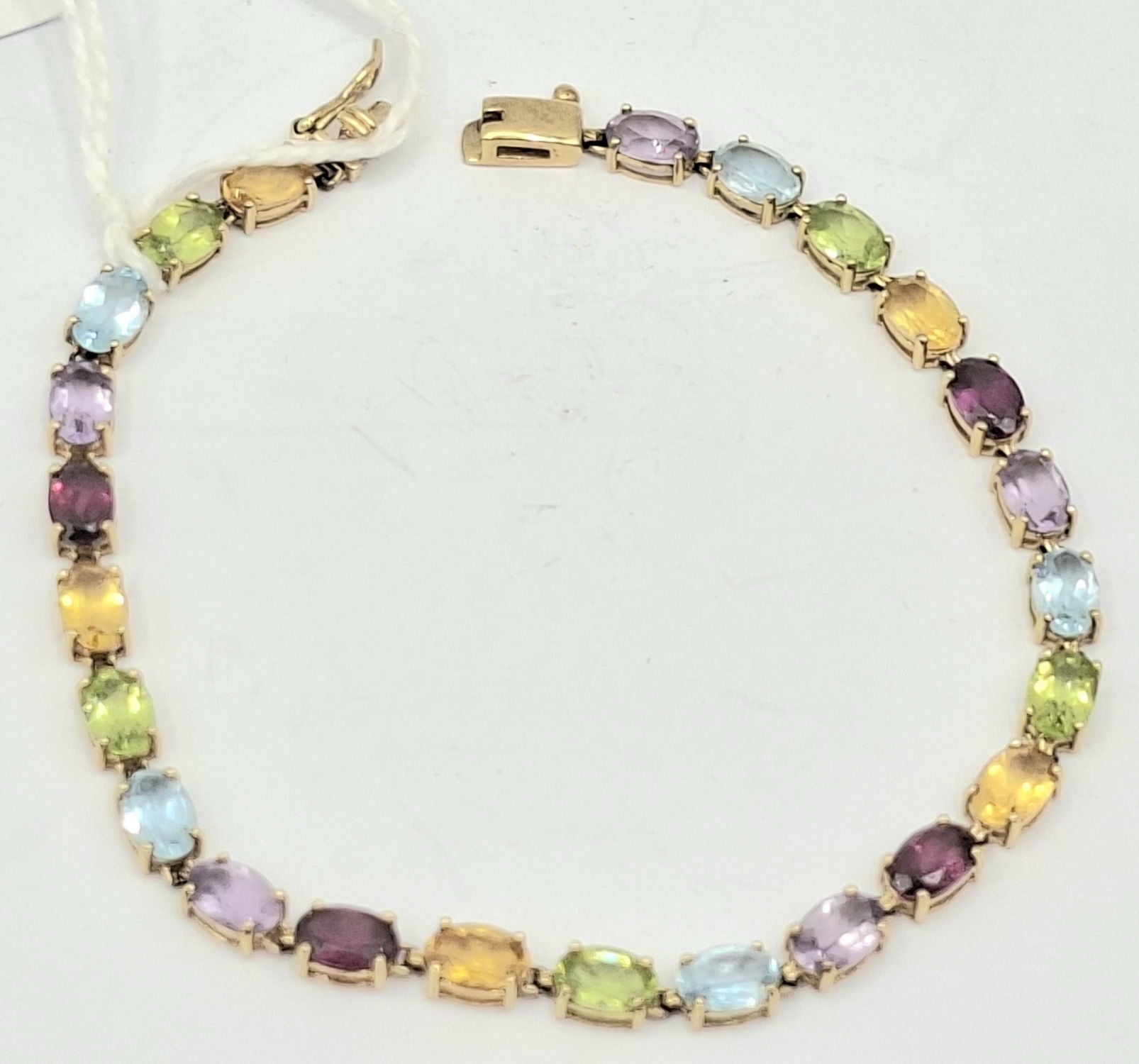 1145 · 9CT GOLD GEMSTONE BRACELET