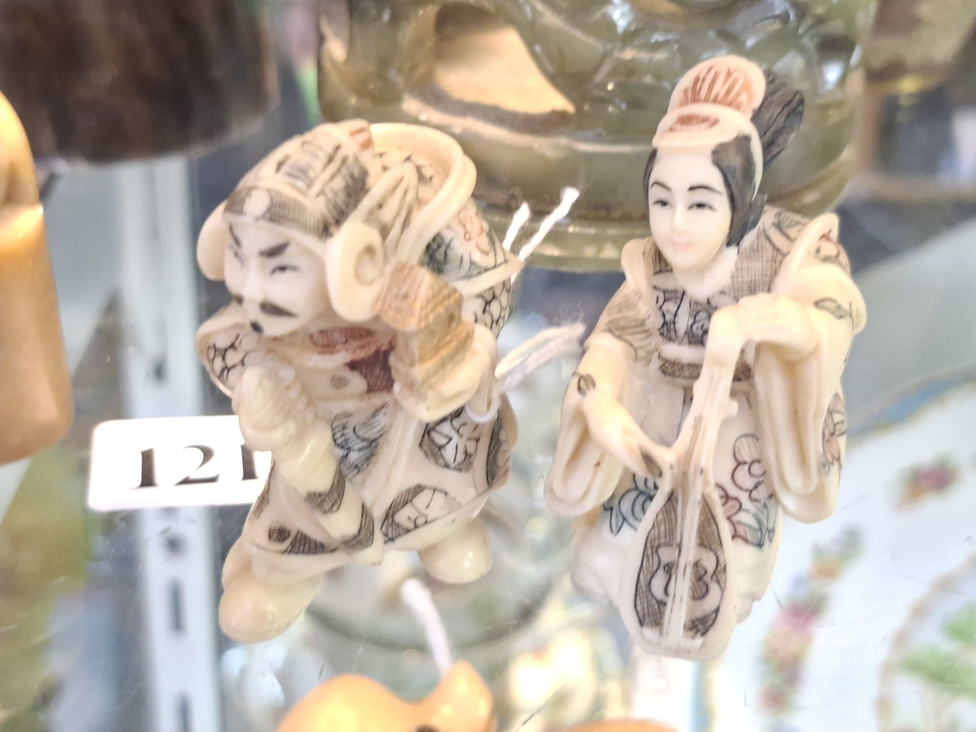 1218 · TWO JAPANESE FIGURINES