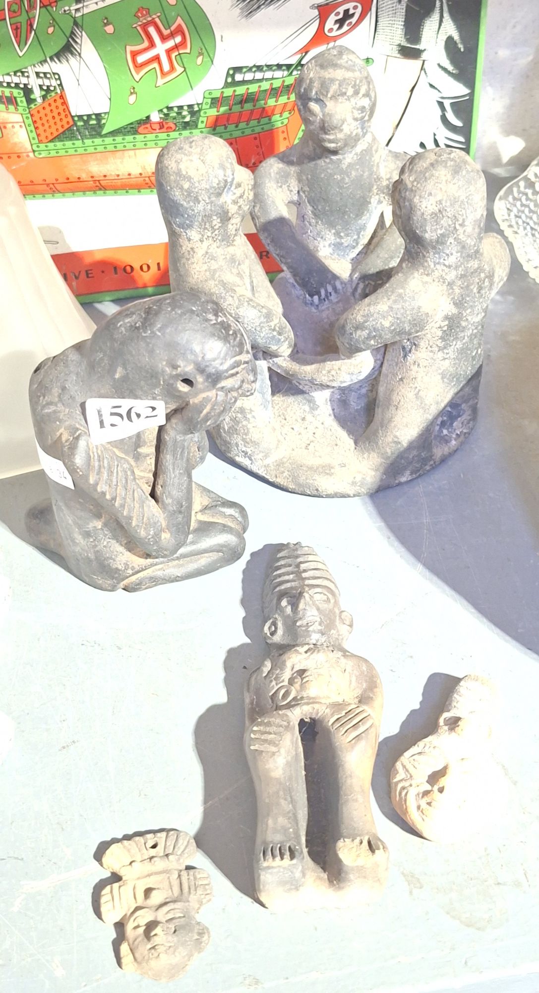 Tribal Statues And Whistle