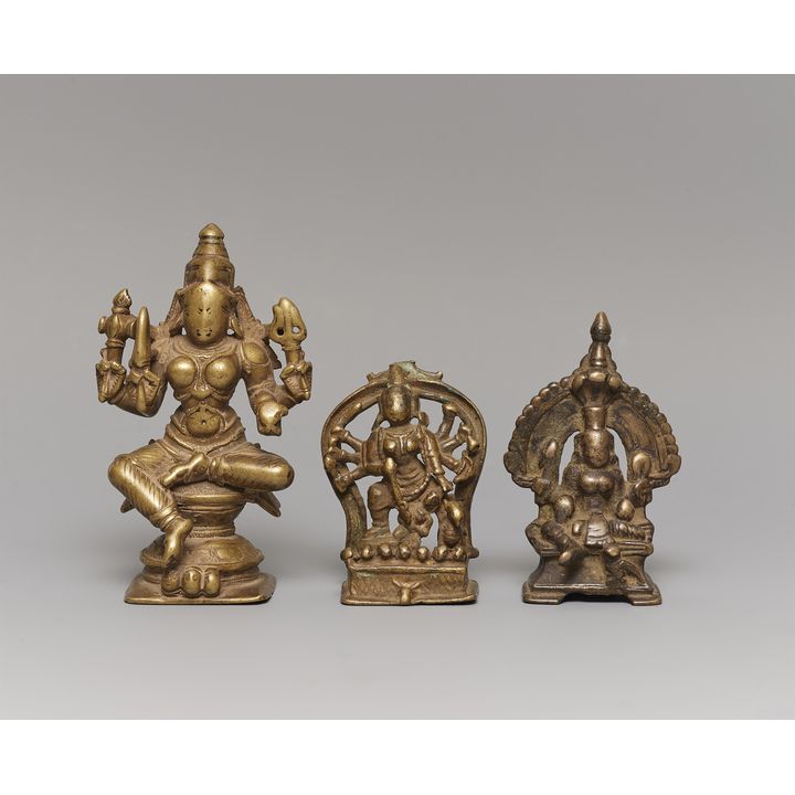 Two Indian copper alloy figures of Durga and another deity. 18/19th century