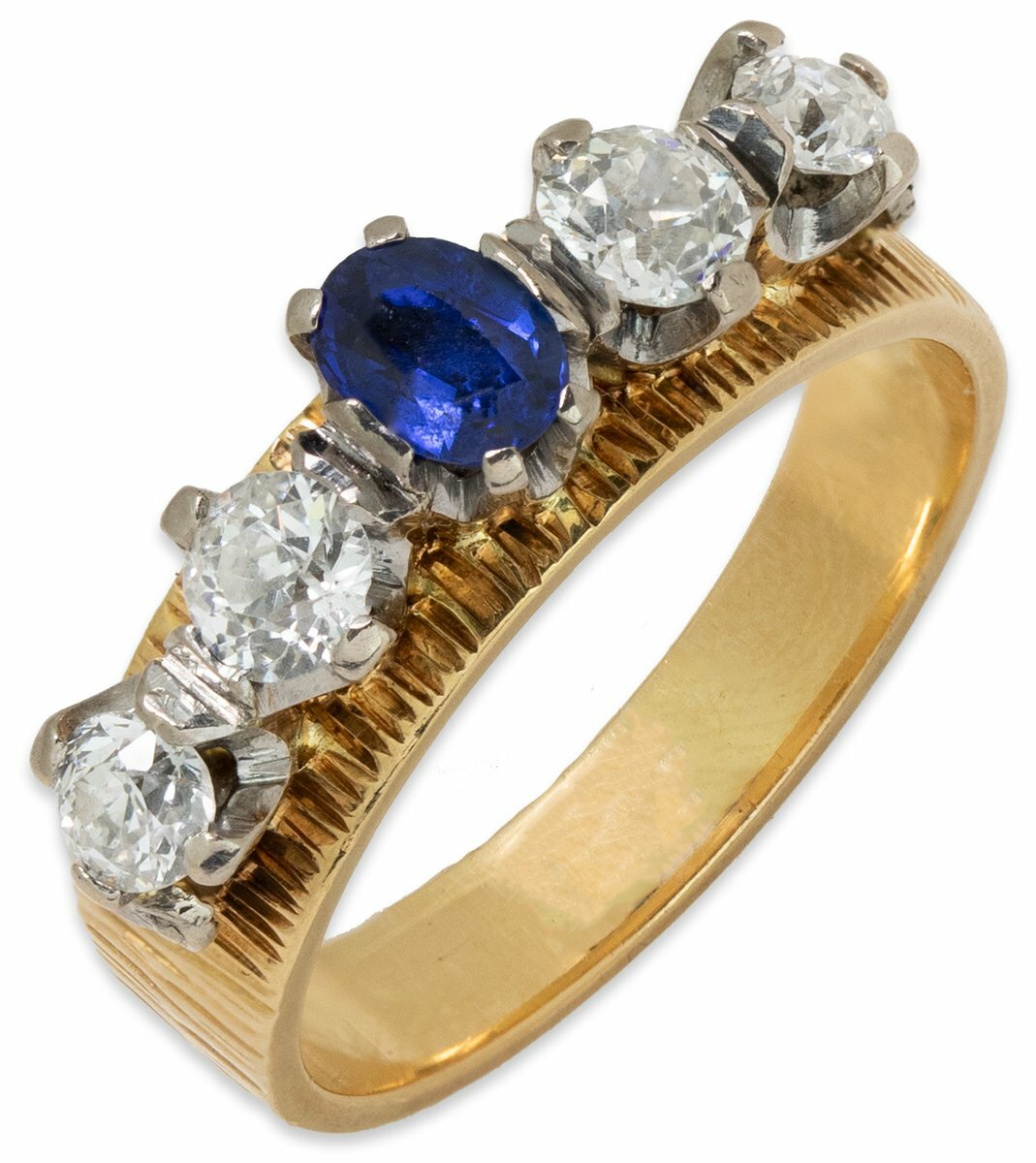 A MID-CENTURY SAPPHIRE AND DIAMOND RING | Spink