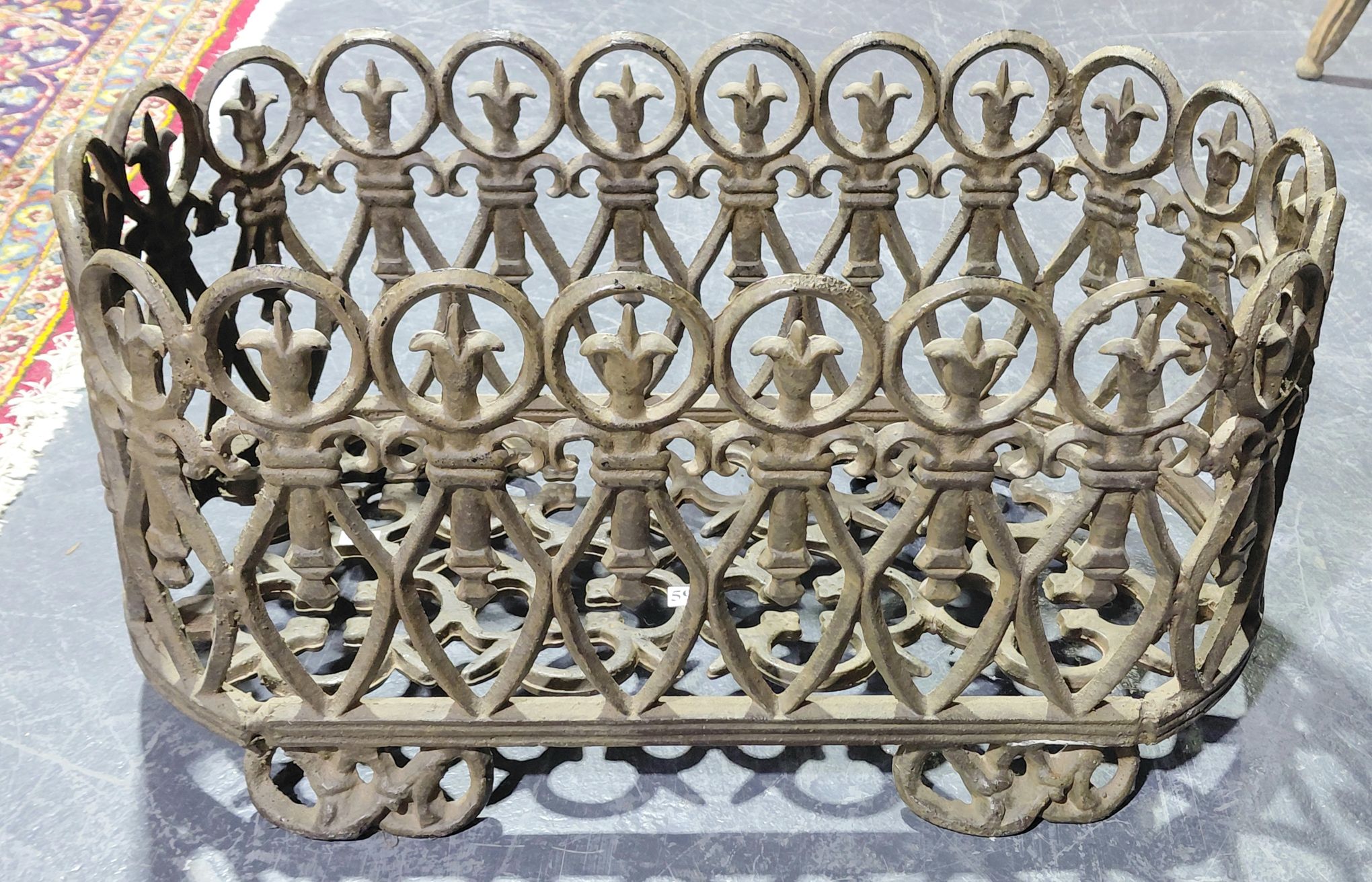 597 · VINTAGE CAST IRON FIRE GRATE