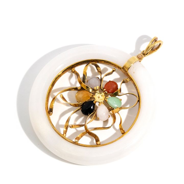 A 10 Carat Gold Jade & Onyx Pendant