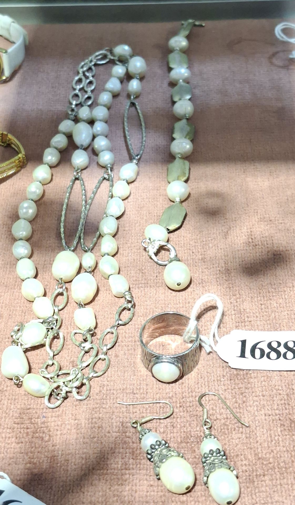 Collection Of Silver And Pearl Jewellery