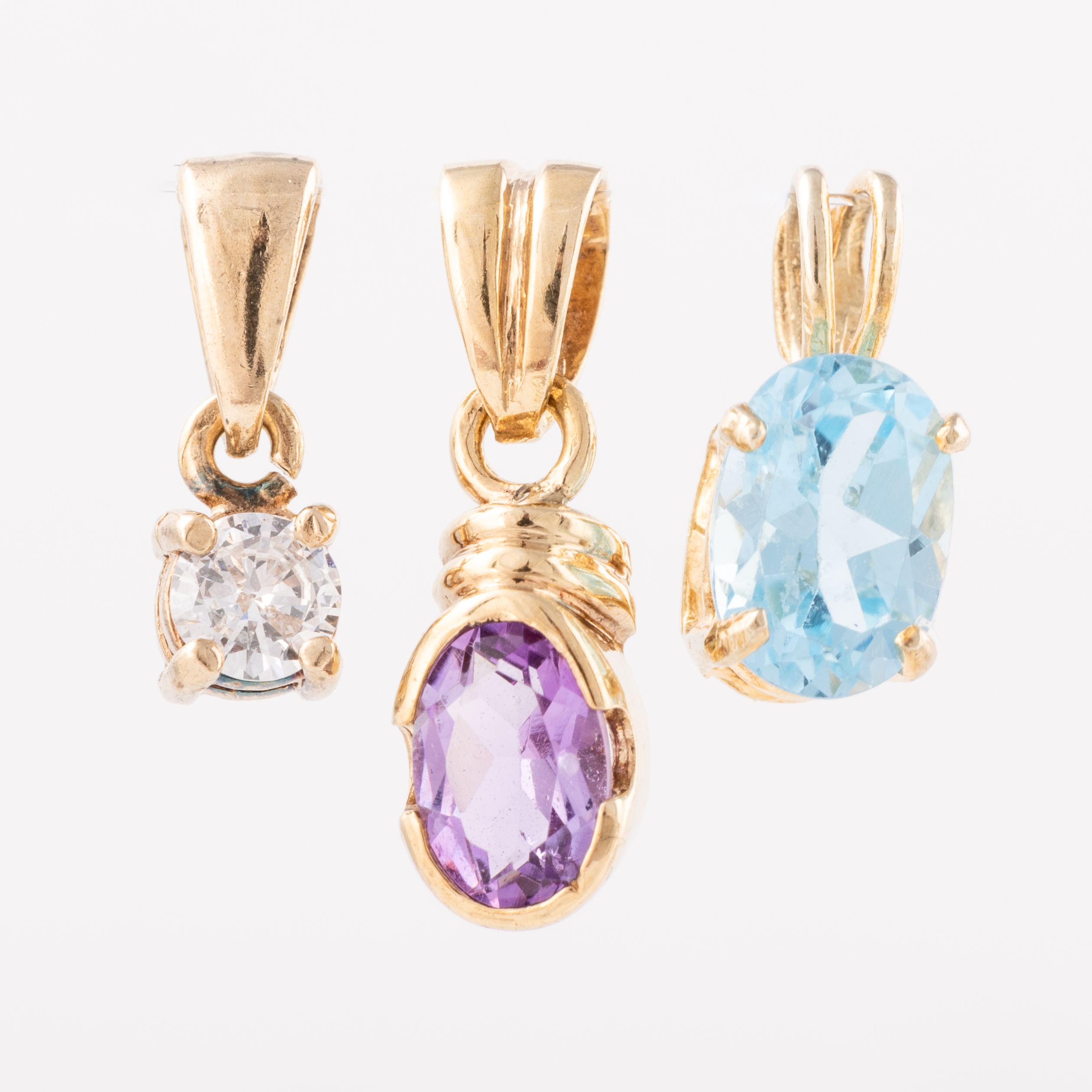 Three 9 Carat Gold Pendants