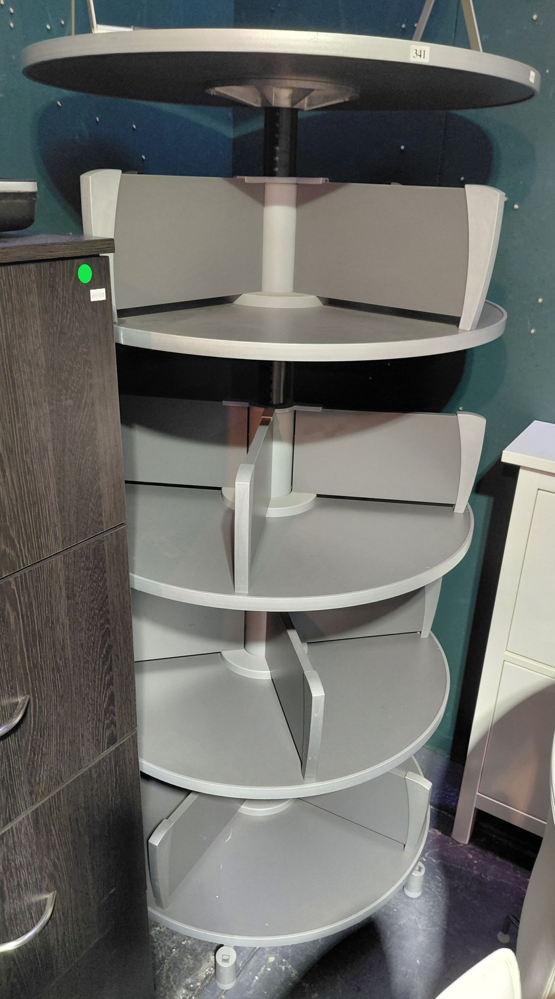 341 · A CONTEMPORARY REVOLVING BOOKCASE