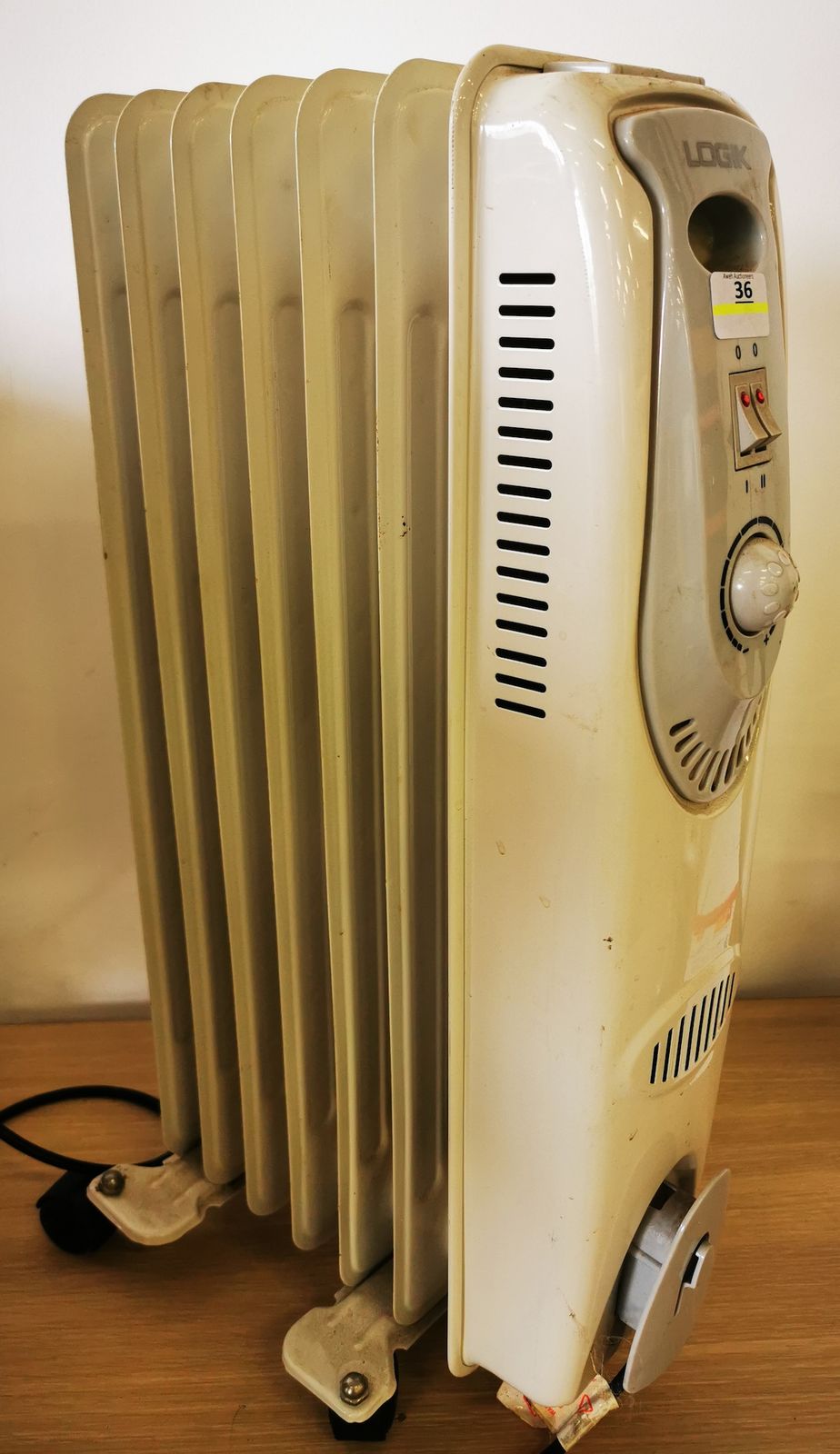 Logik Oil Heater | OldJW Auctioneers