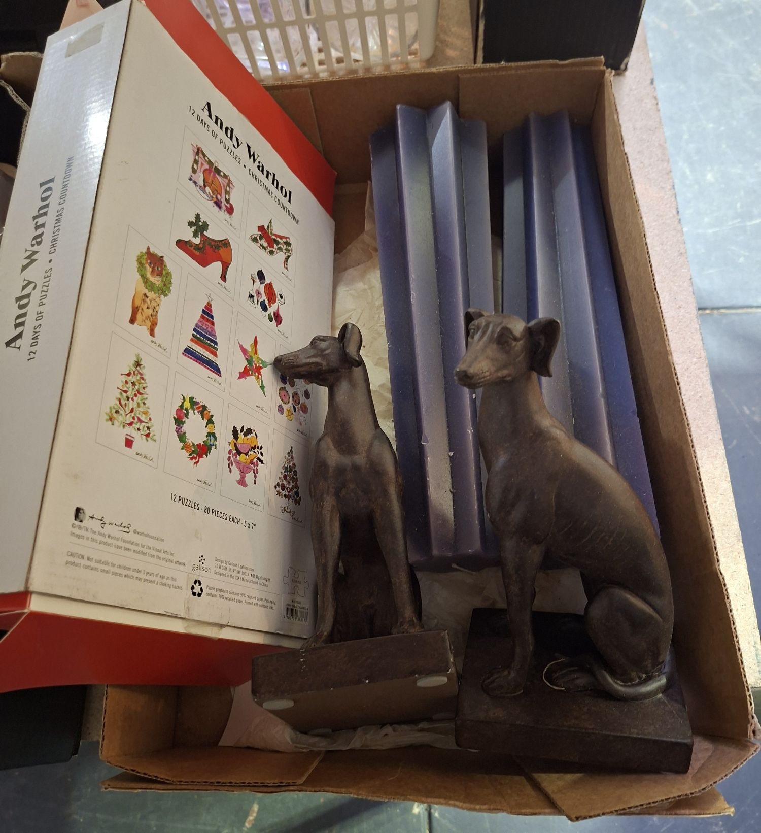 Dog Bookends And Purple Candles