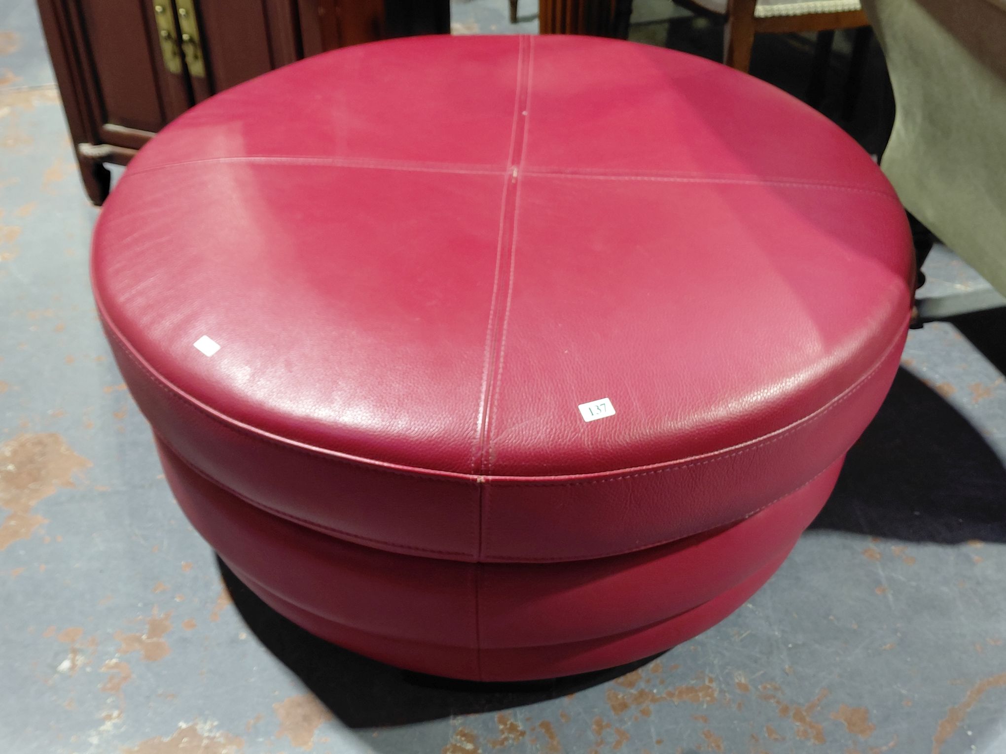 137 · RED LEATHER POUFFE