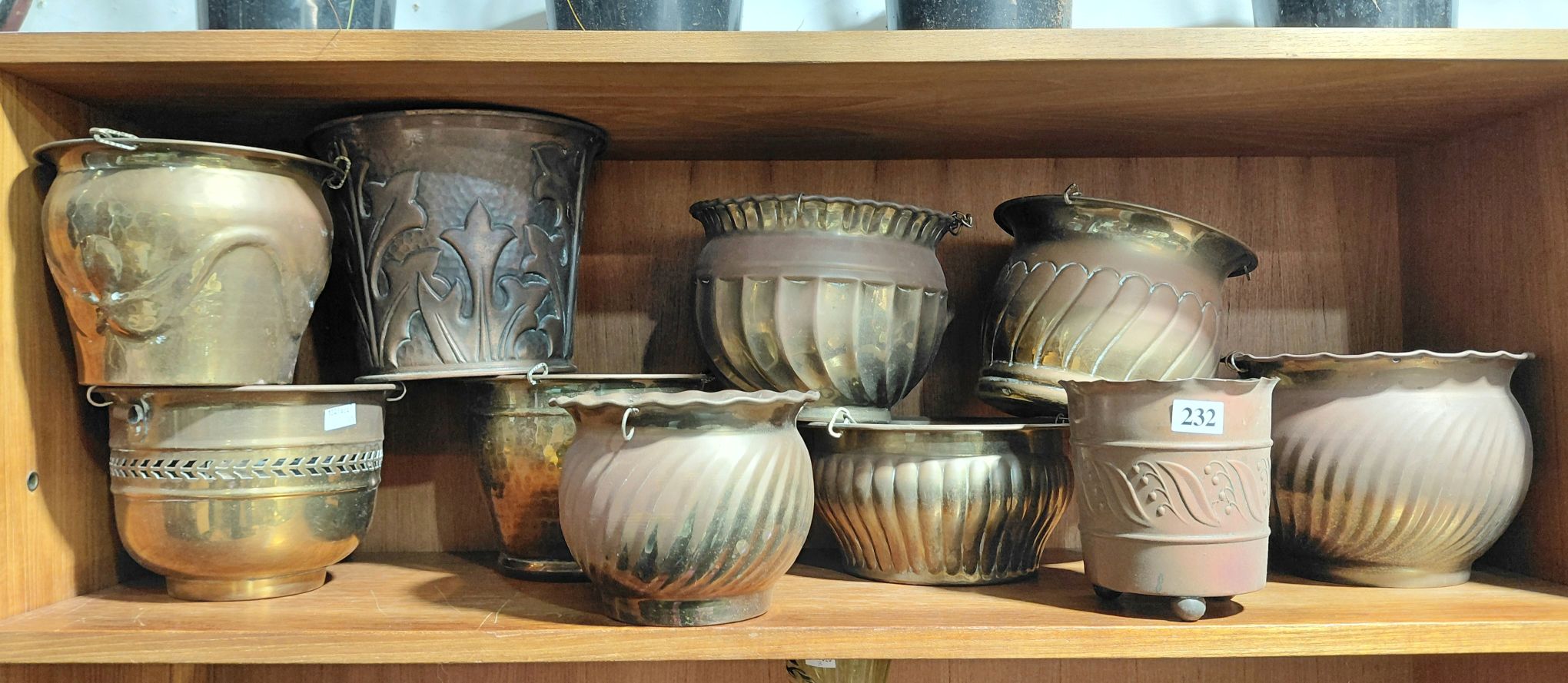 232 · GROUP OF 10 COPPER POTS