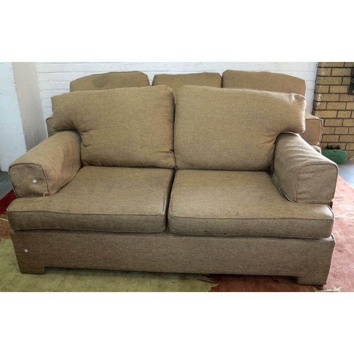 UPHOLSTERED THREE AND TWO-SEATER SOFAS