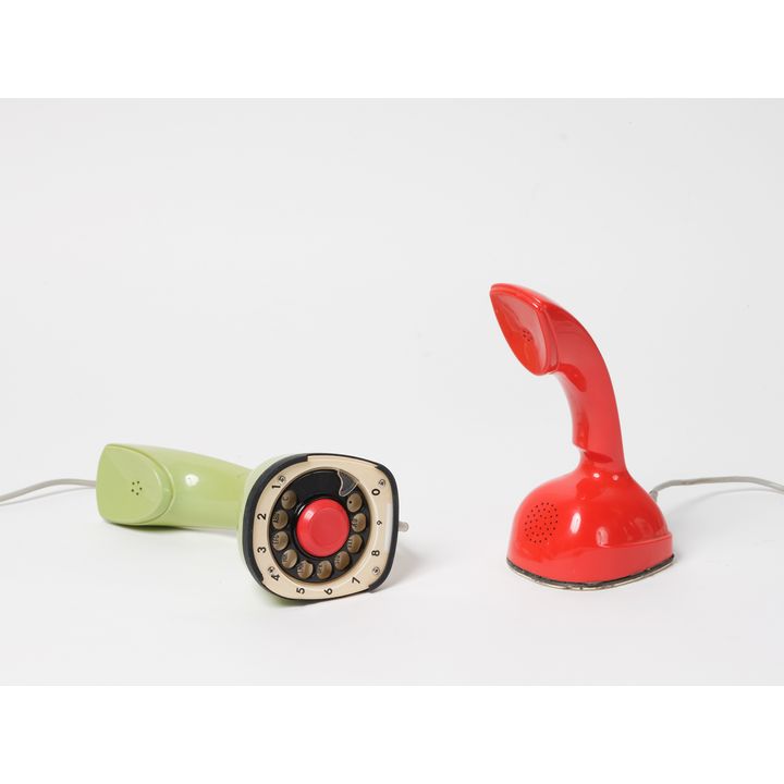 Two ‘Ericofon’ one-piece plastic telephones