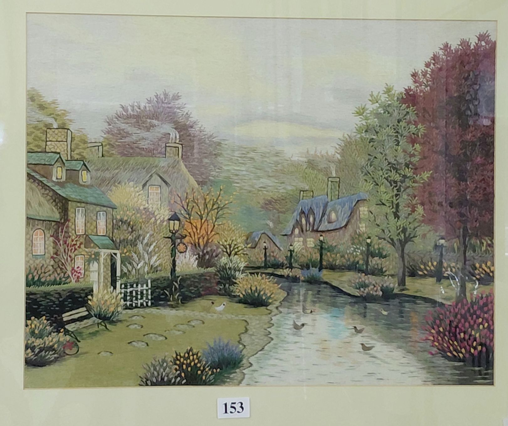 153 · FRAMED EMBROIDERY COTTAGE SCENE