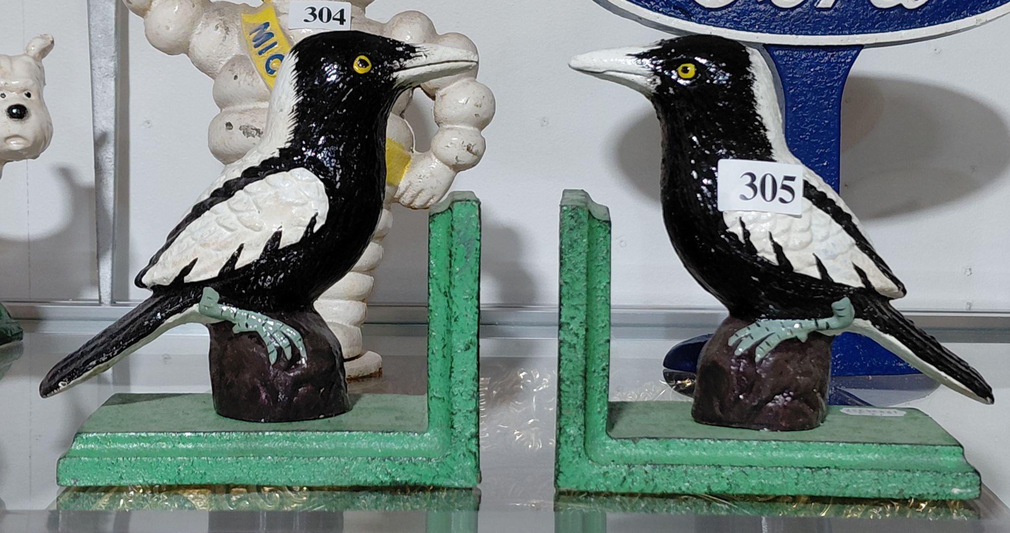 305 · A PAIR OF CAST IRON BOOKENDS